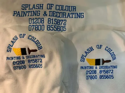Embroidered polo shirts in a team colour